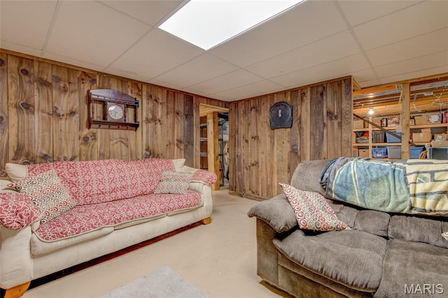 31511 Bowman Station Rd, Jerseyville, IL 62052 - carpeted living room featuring wooden walls and a paneled ceiling