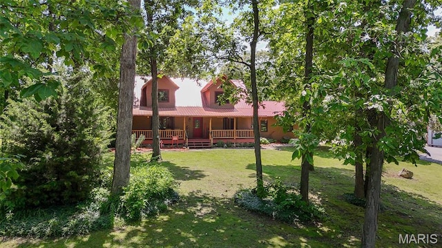 31511 Bowman Station Rd, Jerseyville, IL 62052 - back of house featuring covered porch, a yard, and metal roof