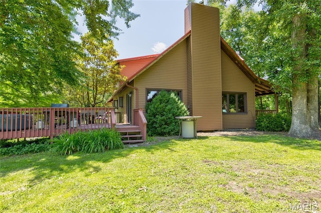 31511 Bowman Station Rd, Jerseyville, IL 62052 - rear view of property with a chimney, a deck, and a yard