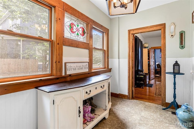 805 W Columbia St, Farmington, MO 63640 - office area with wainscoting, a chandelier, and tile patterned floors