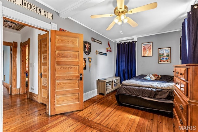 805 W Columbia St, Farmington, MO 63640 - bedroom with wood-type flooring, ornamental molding, and ceiling fan