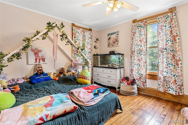 805 W Columbia St, Farmington, MO 63640 - bedroom featuring ornamental molding, hardwood / wood-style floors, and a ceiling fan