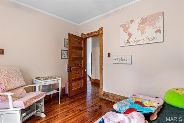 805 W Columbia St, Farmington, MO 63640 - bedroom featuring ornamental molding, wood finished floors, and baseboards