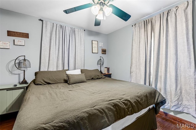 805 W Columbia St, Farmington, MO 63640 - bedroom with wood finished floors and a ceiling fan