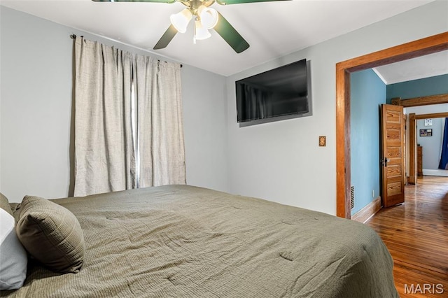 805 W Columbia St, Farmington, MO 63640 - bedroom featuring wood finished floors, ceiling fan, and baseboards