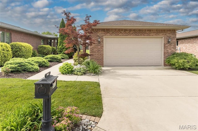 1812 Carrington Way, Belleville, IL 62226 - view of front of home featuring brick siding, driveway, an attached garage, and a front yard