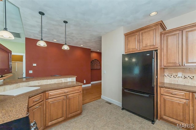 1812 Carrington Way, Belleville, IL 62226 - kitchen featuring freestanding refrigerator, hanging light fixtures, recessed lighting, stone countertops, and baseboards