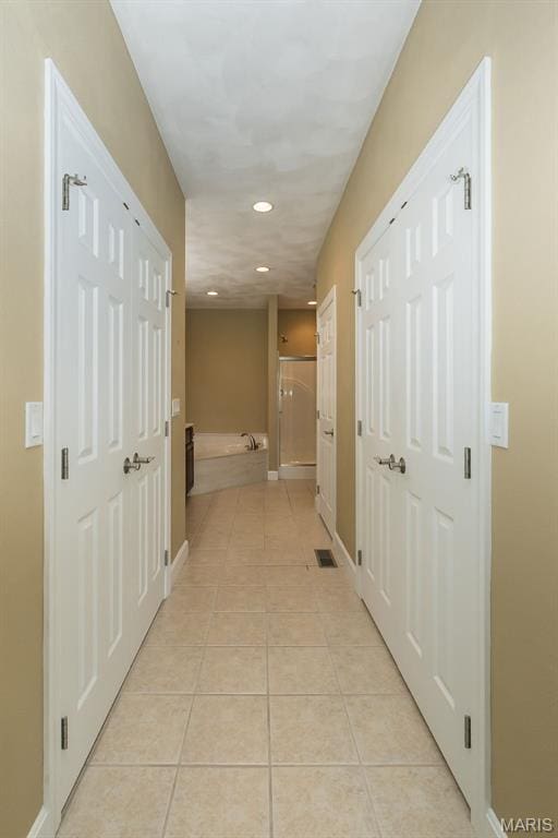 1812 Carrington Way, Belleville, IL 62226 - hall featuring light tile patterned flooring, recessed lighting, and baseboards