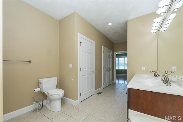 1812 Carrington Way, Belleville, IL 62226 - bathroom featuring tile patterned flooring, vanity, toilet, baseboards, and recessed lighting