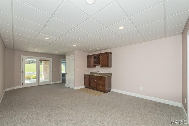 1812 Carrington Way, Belleville, IL 62226 - unfurnished living room with light carpet, baseboards, recessed lighting, a drop ceiling, and a sink