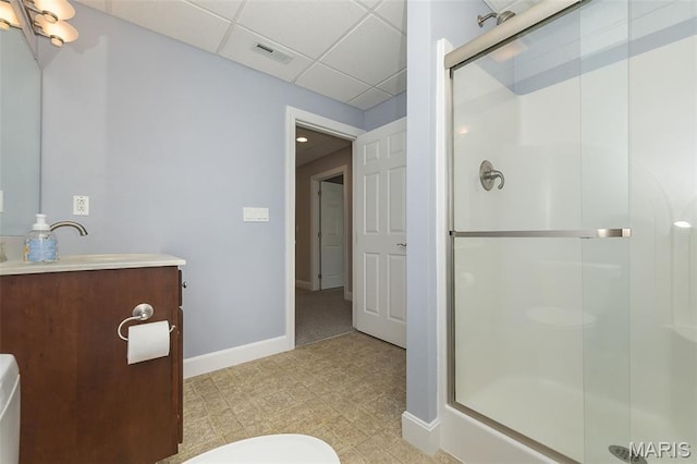 1812 Carrington Way, Belleville, IL 62226 - full bathroom featuring vanity, a shower stall, baseboards, a drop ceiling, and toilet