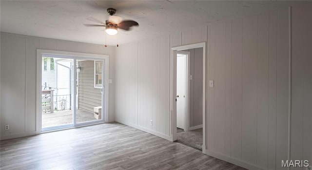 168 Elbring Dr, Hazelwood, MO 63135 - spare room with wood finished floors, baseboards, and ceiling fan