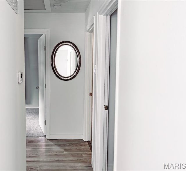 168 Elbring Dr, Hazelwood, MO 63135 - corridor featuring wood finished floors