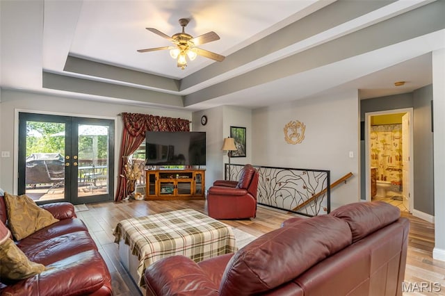 622 Elk Run, Saint Clair, MO 63077 - living room with wood finished floors, french doors, ceiling fan, and a tray ceiling