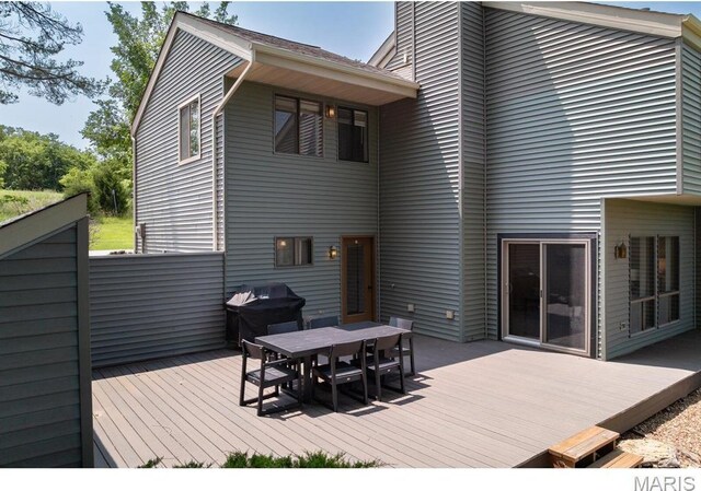 96 Geneva View Dr, Innsbrook, MO 63390 - wooden deck with outdoor dining area and grilling area