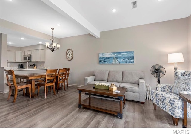 96 Geneva View Dr, Innsbrook, MO 63390 - living room featuring light wood-style floors, baseboards, recessed lighting, a chandelier, and beam ceiling