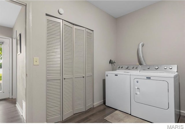 96 Geneva View Dr, Innsbrook, MO 63390 - laundry area with independent washer and dryer, wood finished floors, and baseboards