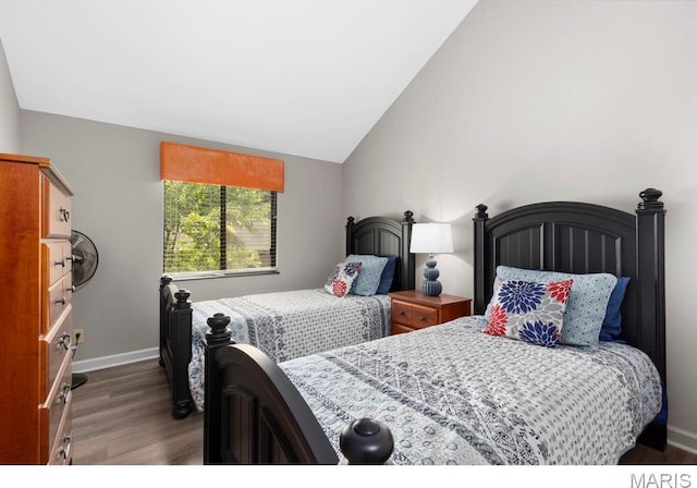 96 Geneva View Dr, Innsbrook, MO 63390 - bedroom featuring wood finished floors, baseboards, and vaulted ceiling