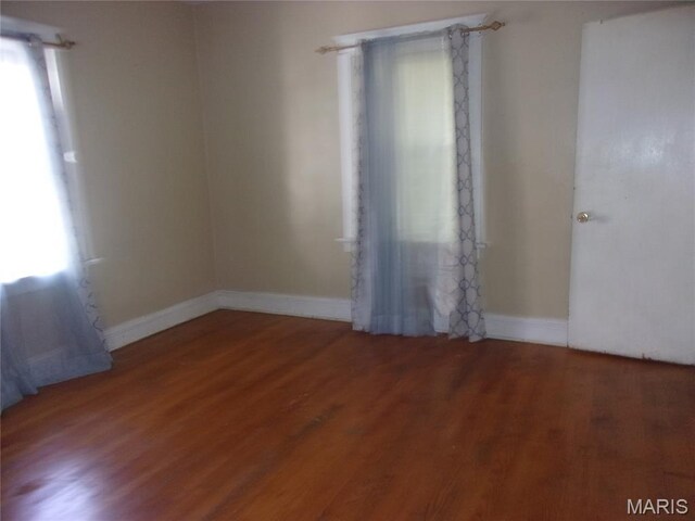 7622 Springdale Dr, Pasadena Park, MO 63121 - unfurnished room with wood finished floors and baseboards