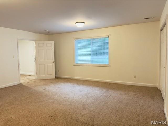 2063 Chesapeake Ave, Cape Girardeau, MO 63701 - carpeted spare room featuring baseboards