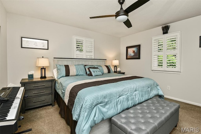 1522 S Oakland Ave, Bolivar, MO 65613 - carpeted bedroom featuring baseboards and a ceiling fan