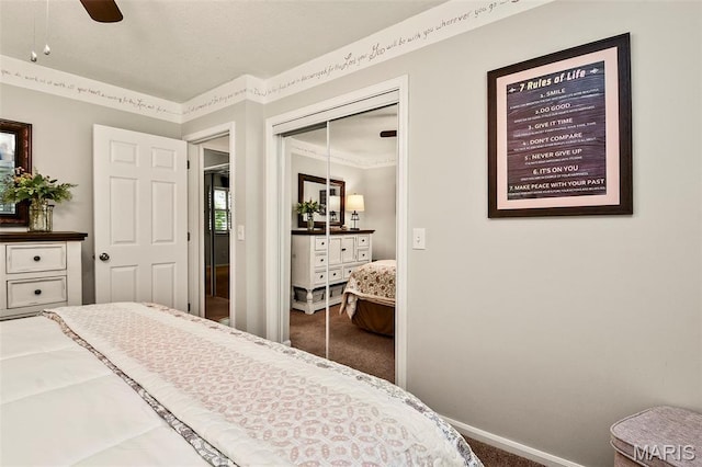 1522 S Oakland Ave, Bolivar, MO 65613 - bedroom featuring carpet, a closet, baseboards, and a ceiling fan