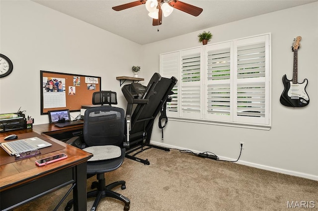 1522 S Oakland Ave, Bolivar, MO 65613 - home office featuring a ceiling fan, carpet flooring, and baseboards