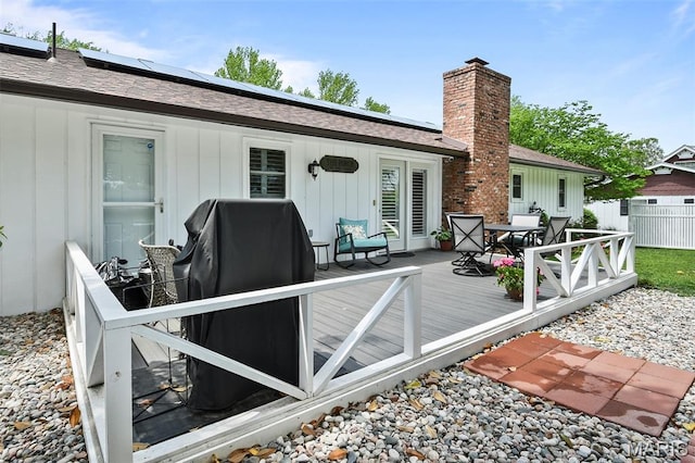 1522 S Oakland Ave, Bolivar, MO 65613 - wooden deck with outdoor dining space
