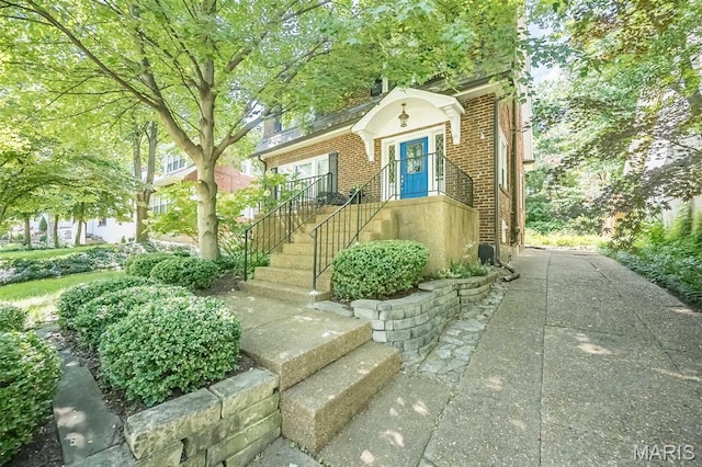 7041 Northmoor Dr, University City, MO 63105 - view of front facade featuring brick siding