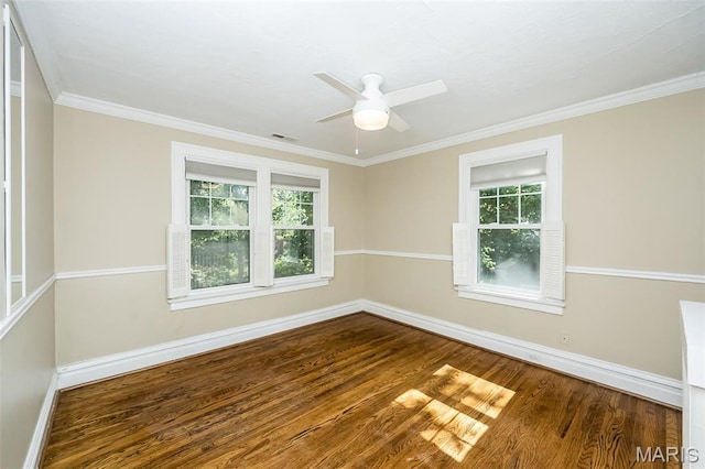 7041 Northmoor Dr, University City, MO 63105 - spare room featuring wood finished floors, a ceiling fan, and crown molding