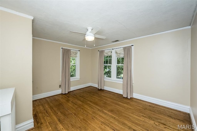 7041 Northmoor Dr, University City, MO 63105 - empty room featuring a ceiling fan, wood finished floors, and ornamental molding