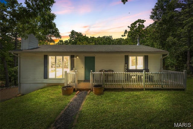 1764 Bourbon Dr, Bonne Terre, MO 63628 - ranch-style home featuring a lawn, a chimney, and a wooden deck