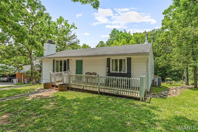 1764 Bourbon Dr, Bonne Terre, MO 63628 - ranch-style house with central AC unit, a front yard, and a chimney