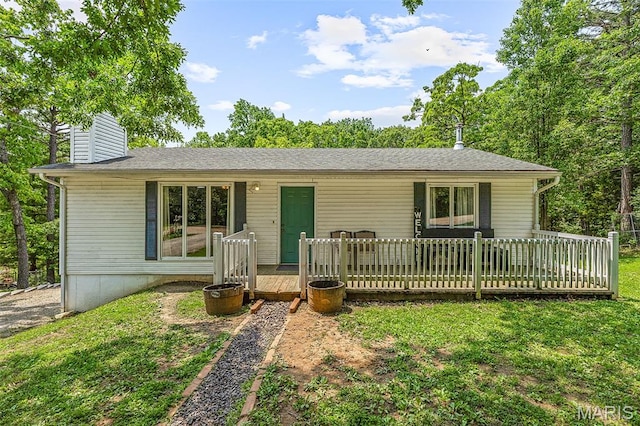 1764 Bourbon Dr, Bonne Terre, MO 63628 - ranch-style house featuring a wooden deck, a front yard, and a chimney