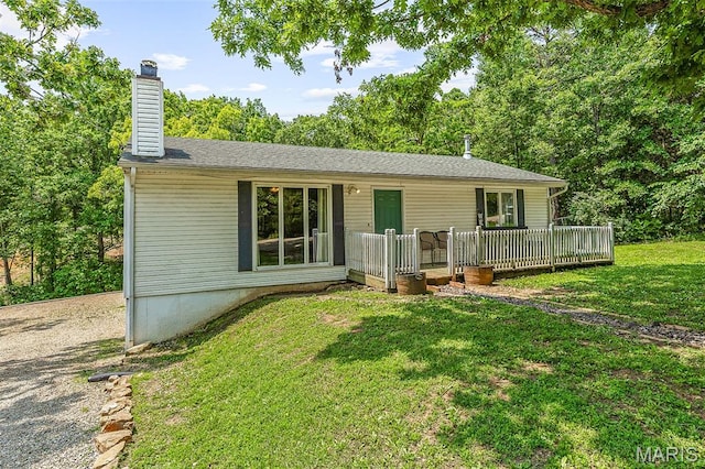 1764 Bourbon Dr, Bonne Terre, MO 63628 - ranch-style house with a chimney, a front yard, and a deck