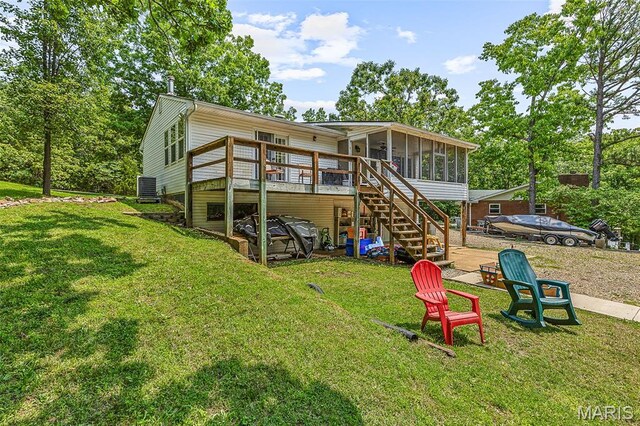 1764 Bourbon Dr, Bonne Terre, MO 63628 - back of house with a sunroom, stairway, a lawn, and a wooden deck