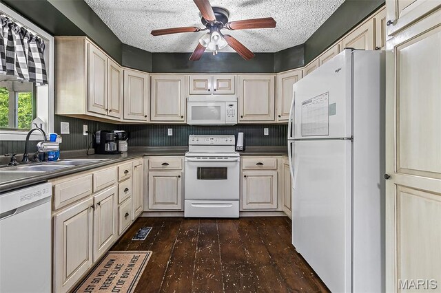 1764 Bourbon Dr, Bonne Terre, MO 63628 - kitchen with white appliances, a sink, dark wood-style floors, ceiling fan, and dark countertops