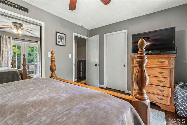 1764 Bourbon Dr, Bonne Terre, MO 63628 - bedroom with access to exterior, wood finished floors, a textured ceiling, and a ceiling fan