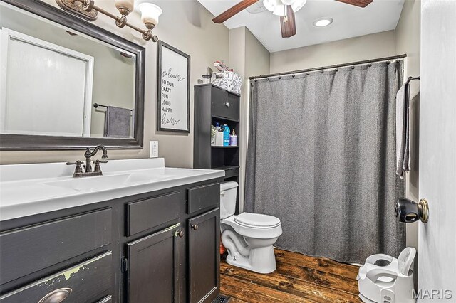 1764 Bourbon Dr, Bonne Terre, MO 63628 - full bath with toilet, a ceiling fan, vanity, wood finished floors, and recessed lighting