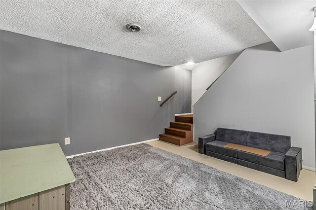 1764 Bourbon Dr, Bonne Terre, MO 63628 - below grade area featuring carpet floors, stairway, a textured ceiling, and baseboards