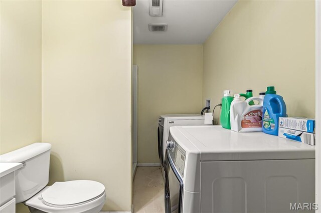 1764 Bourbon Dr, Bonne Terre, MO 63628 - laundry room with washing machine and dryer