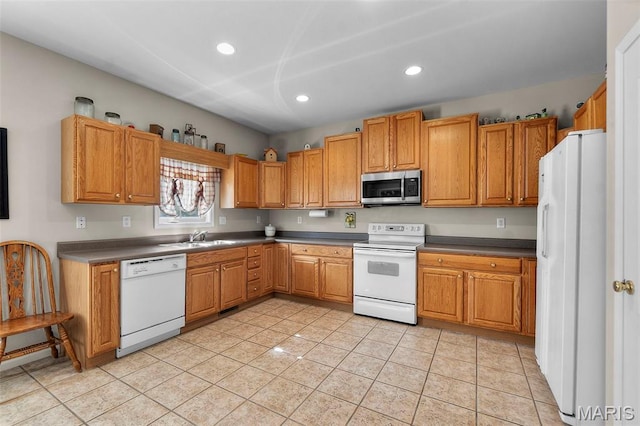 380 Stotler Way, Jackson, MO 63755 - kitchen with white appliances, recessed lighting, a sink, dark countertops, and light tile patterned floors