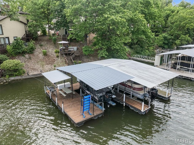63 Portwood Meadows Rd, Rocky Mount, MO 65072 - dock featuring boat lift and a water view