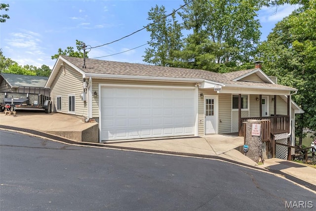 63 Portwood Meadows Rd, Rocky Mount, MO 65072 - single story home with a porch and a shingled roof