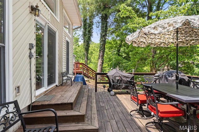 63 Portwood Meadows Rd, Rocky Mount, MO 65072 - wooden terrace with outdoor dining area and area for grilling
