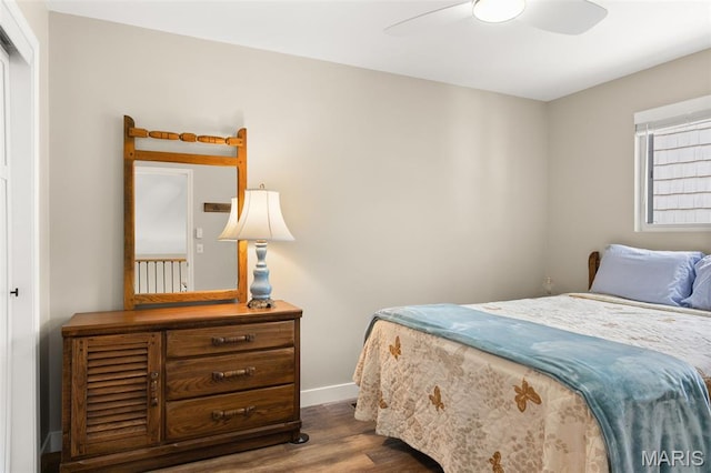 63 Portwood Meadows Rd, Rocky Mount, MO 65072 - bedroom featuring wood finished floors, baseboards, and a ceiling fan