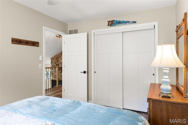 63 Portwood Meadows Rd, Rocky Mount, MO 65072 - bedroom featuring a closet and wood finished floors