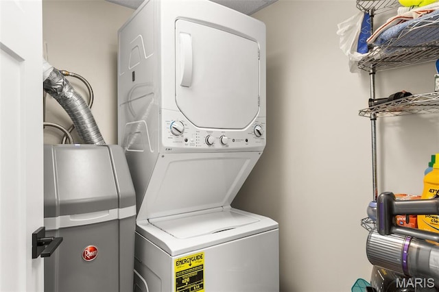 63 Portwood Meadows Rd, Rocky Mount, MO 65072 - washroom featuring stacked washer / dryer