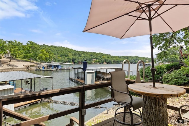 63 Portwood Meadows Rd, Rocky Mount, MO 65072 - dock area with a water view and a forest view