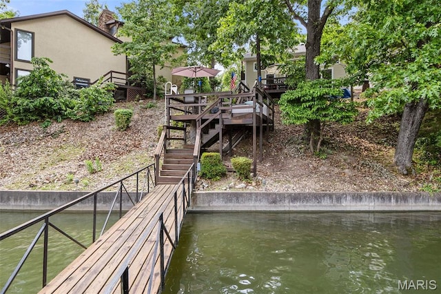 63 Portwood Meadows Rd, Rocky Mount, MO 65072 - dock area with stairway and a deck with water view